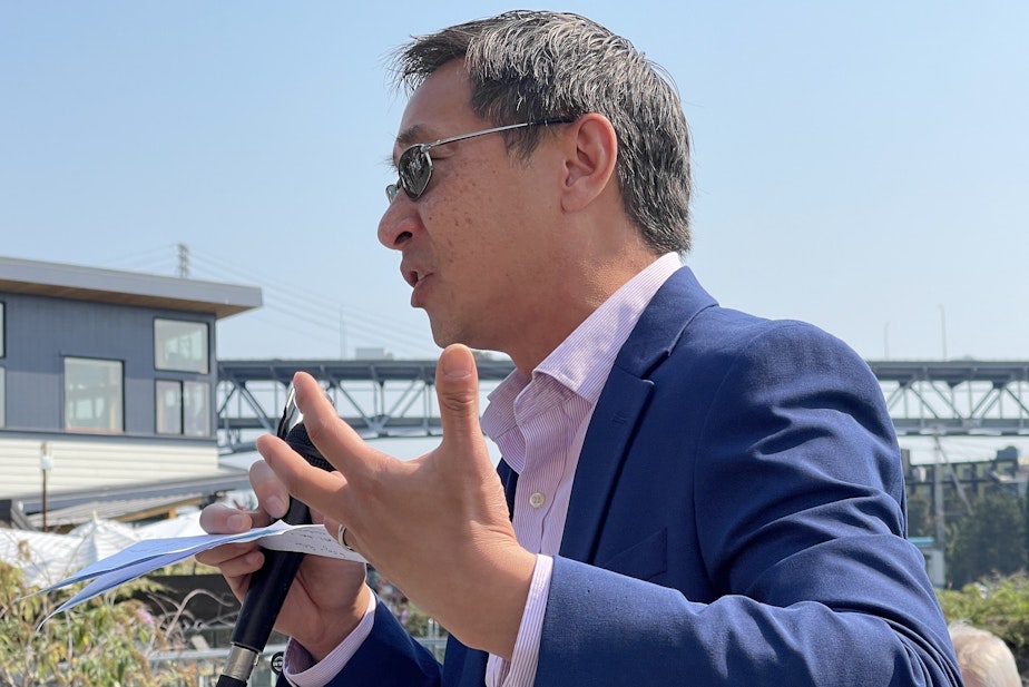 caption: Seattle Public Utilities general manager Andrew Lee speaks at the opening of a bioswale above Seattle's Lake Union on Sept. 6, 2024.