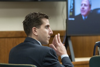 caption: Bryan Kohberger listens to arguments during a hearing, Oct. 26, 2023, in Moscow, Idaho.