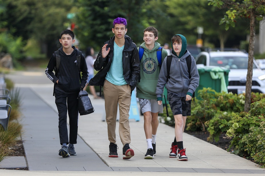 caption: Freshman students at Roosevelt High School on their first day of school, September 4, 2024, from left to right: Miles Reynolds, Oliver Collins, Sean Sanford, Declan Merow. While they didn't give too much thought to their first-day outfits, Declan said, "We just wanna look good on our first day." Miles added, "But we also want to look like ourselves."