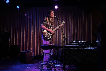 caption: Ken Stringfellow performs on Wednesday, October 6, 2021, at the Clock-Out Lounge in Seattle. 