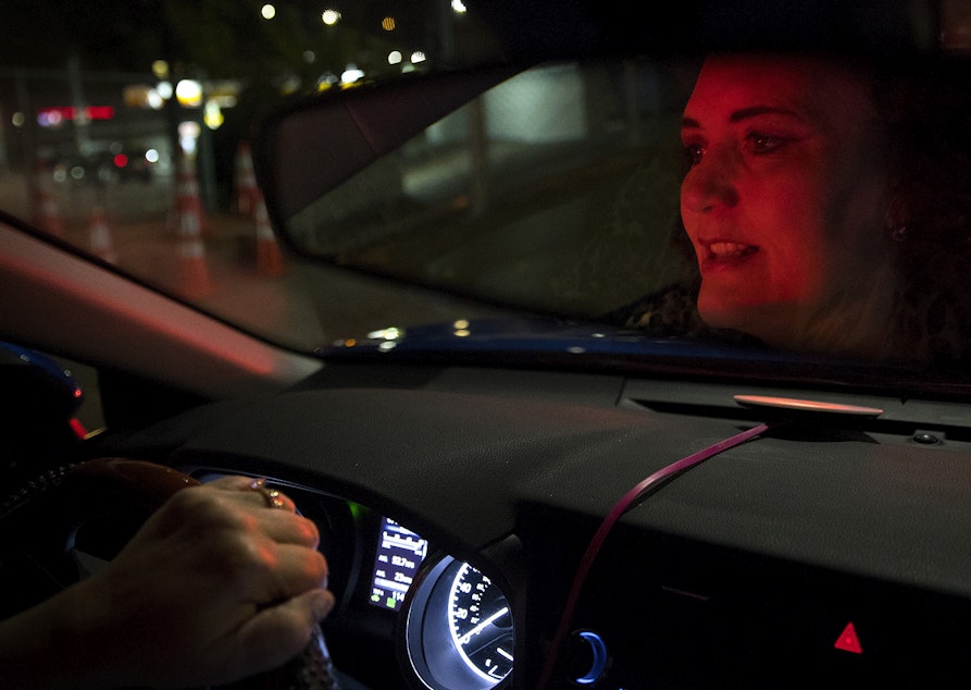 caption: Melinda Miner drives for Uber on Tuesday, September 10, 2019. She's been driving the night shift for four years, hitting the road at 11 p.m. and driving until 6 or 7 a.m. Miner drives for both Uber and Lyft.