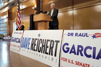 caption: Republican candidate for governor, Dave Reichert, speaks at a primary election night party Aug. 6, 2024. 