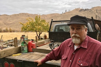 caption: Rancher Dave Creveling believes the cost of a new Washington state carbon fee would be passed along to rural people like him if voters approve it. CREDIT: ASHLEY AHEARN