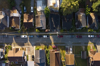 caption: Homes are shown in the Beacon Hill neighborhood of Seattle in July of 2020. 