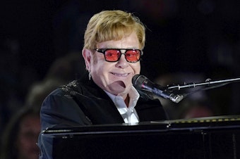 caption: Elton John performs on the South Lawn of the White House in Washington, Friday, Sept. 23, 2022.