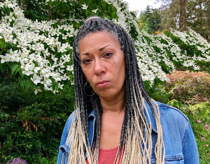 caption: Angel Graves, a student and family advocate in Seattle Public Schools, stands for a portrait on June 23, 2020.