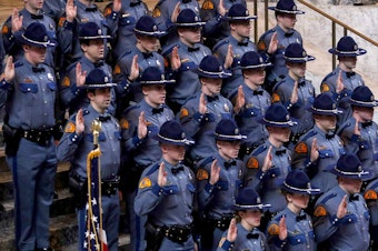 caption: Thirty-one new Washington State Troopers take the oath and are sworn in, joining the force with graduation ceremonies in the Capitol building in Olympia, WA.  The ceremony was in the Capitol Rotunda.&#13;&#13;Thursday Dec 13, 2018 208741