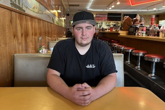 caption: Daniel Thimsen is a cook at Twede's Cafe in North Bend. He also has the distinction of having been chased by a zebra nearby.