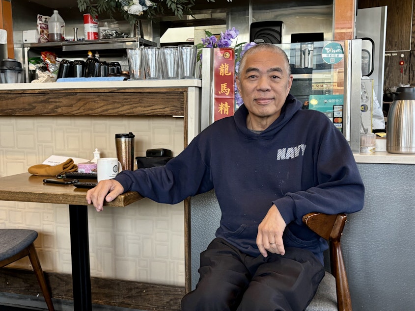 caption: Seattle voter Henry Ku, 70, is portrayed on Friday, Dec. 6, 2024, at his restaurant, Henry's Taiwan Kitchen. He supported Tanya Woo in the November 2024 Seattle City Council election.