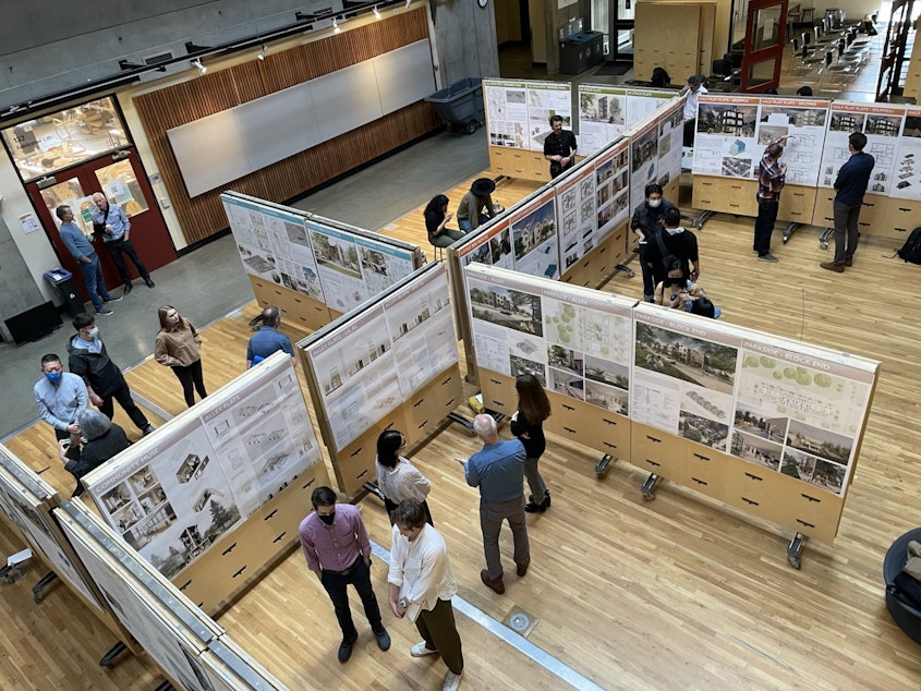 caption: Students present their projects to community experts - including architects and planners who'll have a hand in writing Seattle's Comprehensive Plan Update. Gould Hall, UW Campus, June 6, 2022