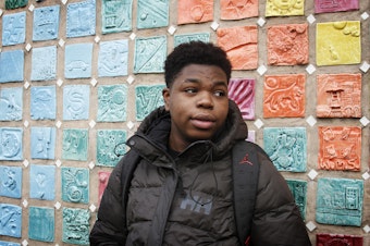 caption: Eighth-grader Jakwaun Shannon posed for a portrait outside of Washington Middle School on Feb. 12, 2020. Jakwaun says he was belittled by his math teacher, James Johnson. Johnson transferred to Washington from Meany Middle School, where he punched a child in the jaw.