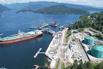 caption: Aerial view of the expanded Trans Mountain oil export terminal in Burnaby, British Columbia. The Westridge Marine Terminal now has three berths, up from one.