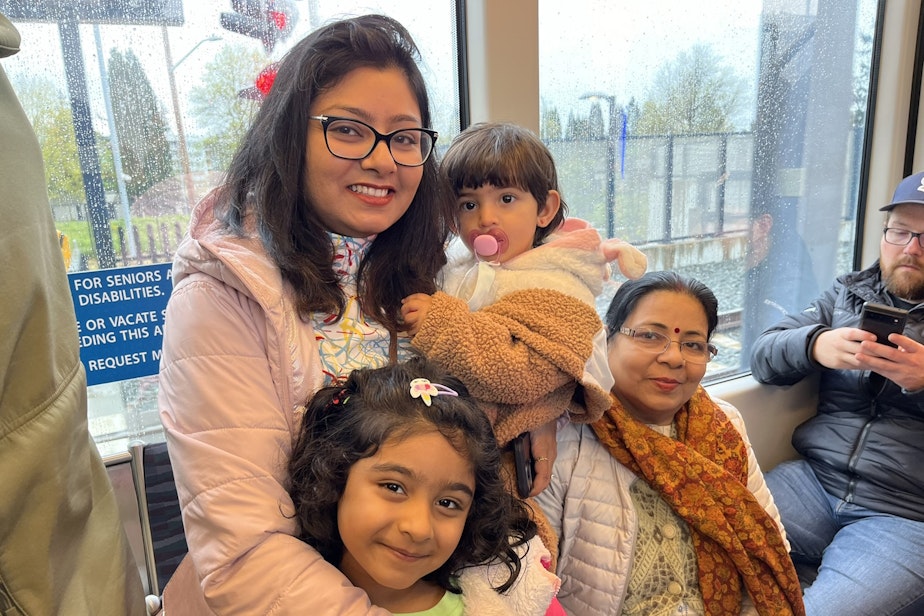 caption: Anu Radha and her family