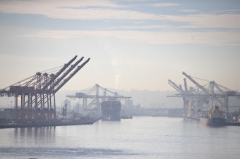 caption: The Port of Seattle is shown from the Columbia Tower Club on Thursday, October 18, 2018, in Seattle. 