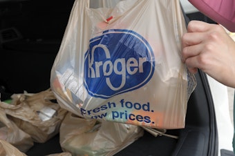 caption: FILE - A customer removes her purchases at a Kroger grocery store in Flowood, Miss., Wednesday, June 26, 2019. Kroger and Albertsons are selling more than 400 stores and other assets to C&S Wholesale Grocers in an approximately $1.9 billion deal as part of their efforts to complete their merger, Friday, Sept. 8, 2023. 