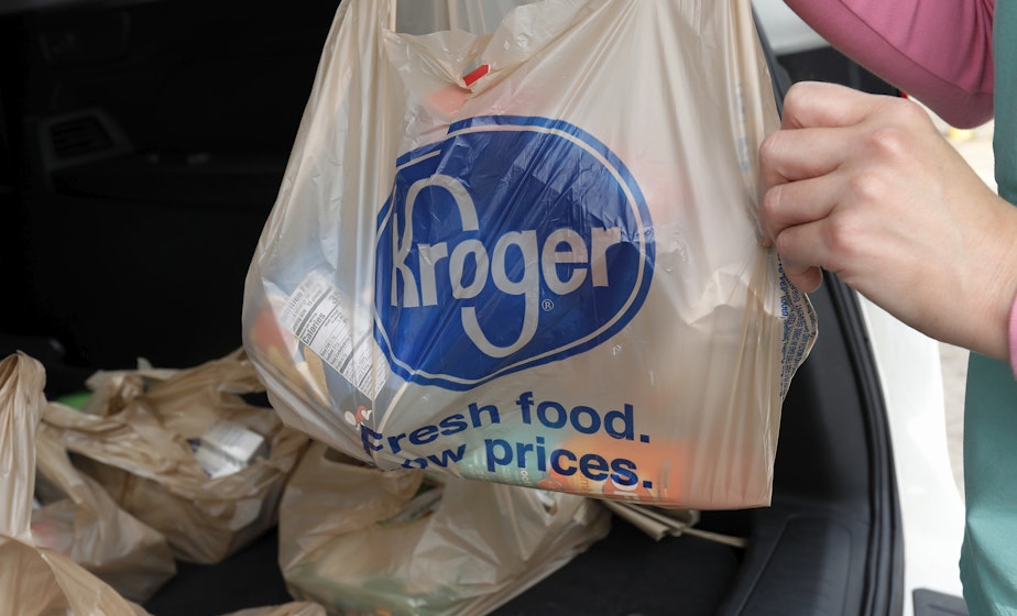 caption: FILE - A customer removes her purchases at a Kroger grocery store in Flowood, Miss., Wednesday, June 26, 2019. Kroger and Albertsons are selling more than 400 stores and other assets to C&S Wholesale Grocers in an approximately $1.9 billion deal as part of their efforts to complete their merger, Friday, Sept. 8, 2023. 