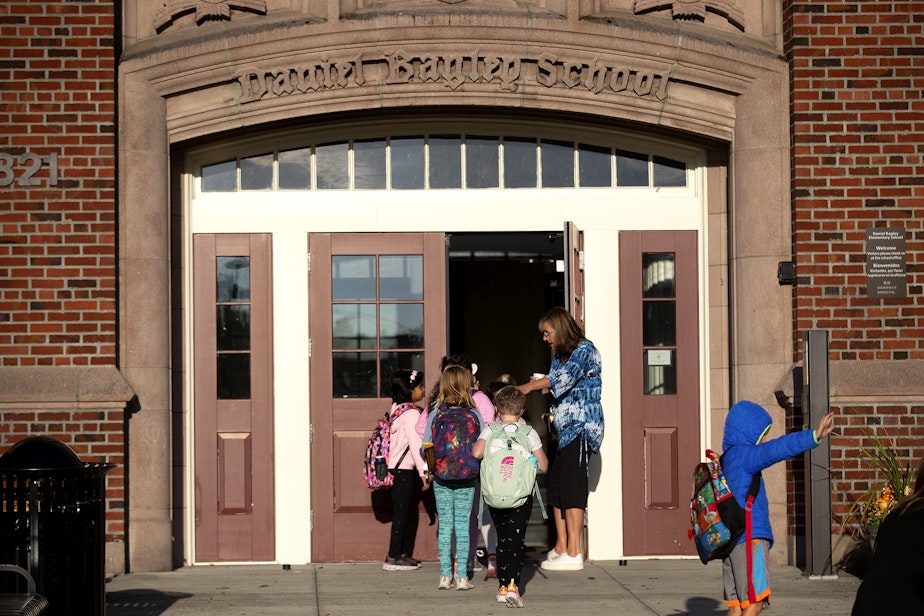 caption: Students arrive for their first day of school on Wednesday, Sept. 6, 2023, at Daniel Bagley Elementary School in Seattle. 