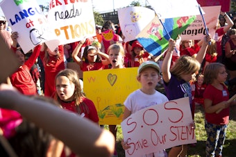 caption: Hundreds of Seattle Public Schools students and parents gathered for a rally demanding that schools remain open, ahead of the Seattle Public Schools board meeting on Wednesday, September 18, 2024, at the John Stanford Center for Educational Excellence building in Seattle. 