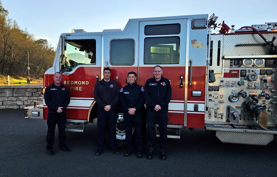 caption: Left to right: Lieutenant Jeff Poff, Firefighter Lucas Hughes, Firefighter Jeff Carroll, and Driver Engineer Paul Smith with the Redmond Fire Department