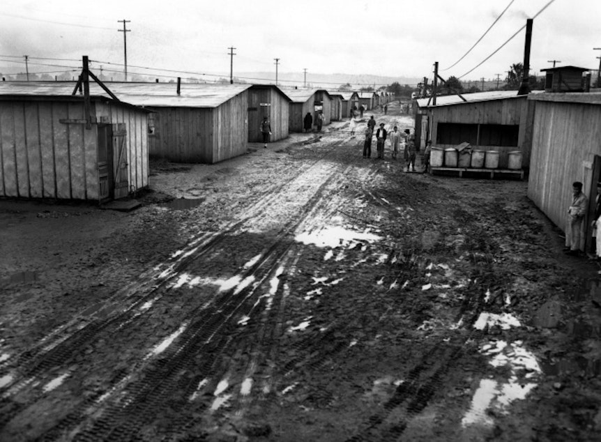 caption: Muddy conditions at Puyallup Assembly Center, Washington, 1942.