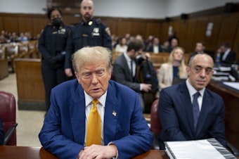 caption: Former President Donald Trump attends his trial in Manhattan criminal court on May 2. The judge in the case heard arguments related to the prosecution's request to fine Trump for violating a gag order in the case.