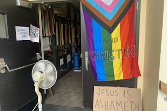 caption: The entrance to the sit-in space inside Demaray Hall on Seattle Pacific University's campus.