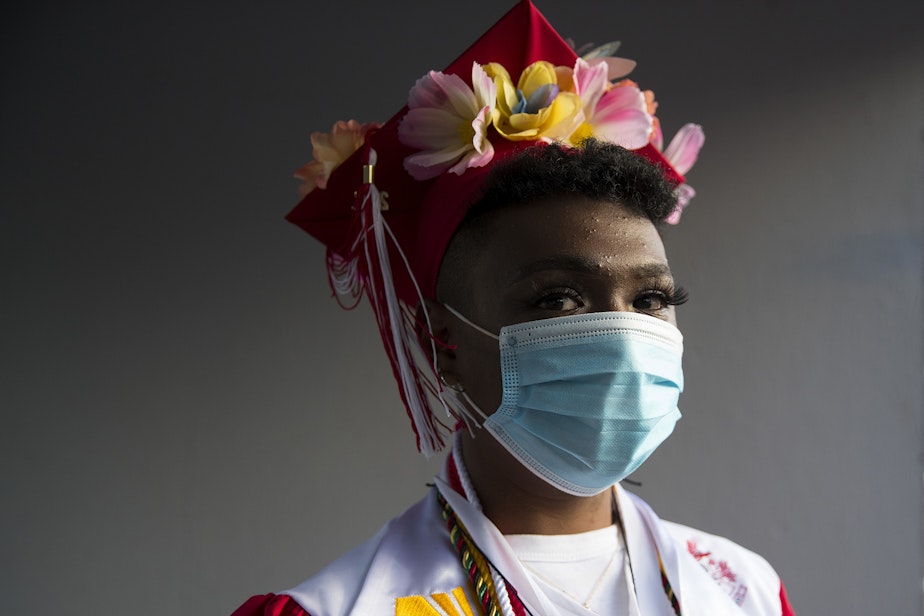 caption: Cleveland Stem High School senior Amanjey Kidane stands for a portrait ahead of the in-person commencement ceremony on Tuesday, June 15, 2021, at Memorial Stadium in Seattle. "We're growing up into adulthood and it's going to be overwhelming, but this is kind of like a new chapter," said Kidane. "I'm very excited but at the same time kind of anxious."