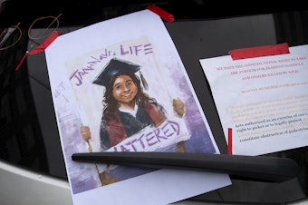 caption: Protesters gather for a rally in honor of Jaahnavi Kandula, who was killed by a Seattle Police Officer while crossing a street, on Saturday, September 23, 2023, at the intersection of 5th Avenue South and South Jackson Street in Seattle. 