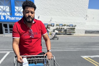 caption: Luis Escarraman spent $139 when he picked up some vitamin C and a few items of clothing for himself and his daughter. "I need to work extra to get what I used to have before," he told NPR.