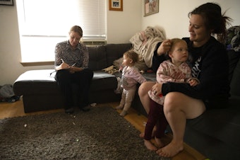 caption: Toni Gardner, lead case manager for Sound Pathways, visits with Kierra Fisher at her home on Friday, September 23, 2022, in Marysville. 