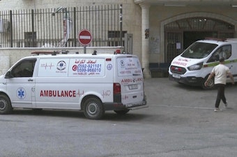 caption: This image is taken from an Associated Press video showing Aysenur Ezgi Eygi's body being transported through the Rafidia Surgical Hospital, where she was taken after after witnesses say she was fatally shot by Israeli soldiers, Sept. 6, 2024, in the West Bank city of Nablus. 