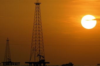 caption: Oil drills in Maracaibo Lake in Venezuela's oil rich Zulia state. The U.S. is renewing sanctions on Venezuela's oil industry.