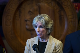 caption: Interim Seattle police chief Sue Rahr addresses the press after Mayor Bruce Harrell announced that former chief Adrian Diaz would be stepping down on Wednesday, May 29, 2024, at City Hall in Seattle.