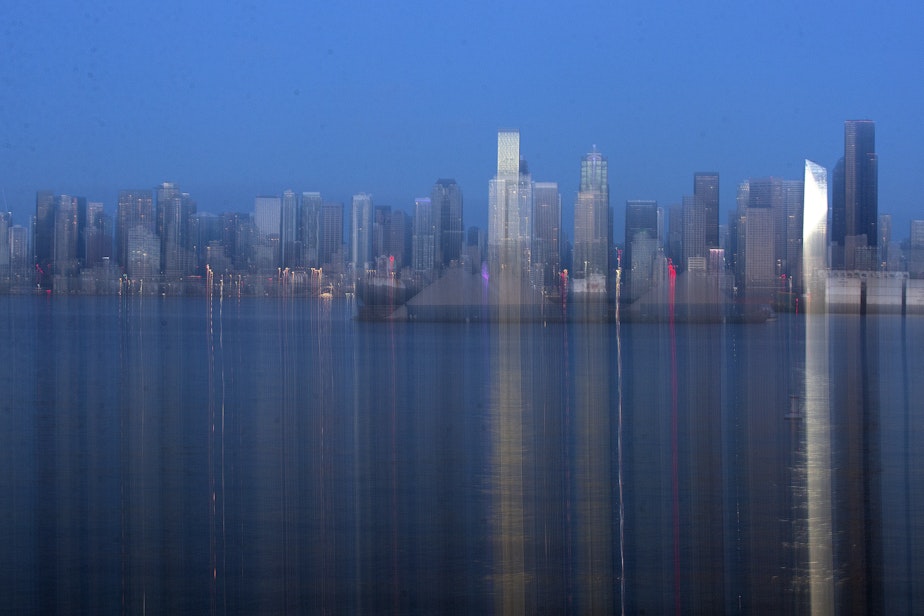 caption: Downtown Seattle is shown as the sun goes down on Tuesday, October 29, 2024, from West Seattle. 