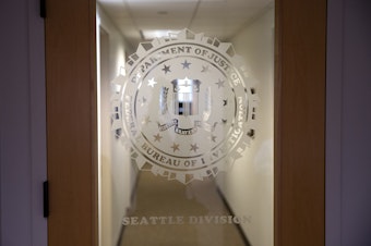 caption: A door at the FBI Seattle field office is shown on Monday, November 4, 2024, in Seattle. KUOW Photo/Megan Farmer