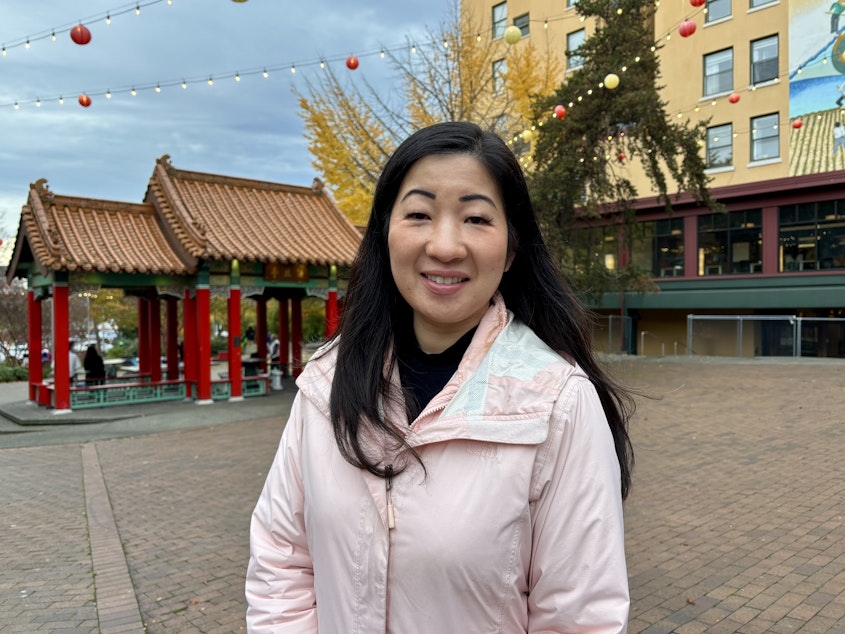 caption: Former Seattle City Councilmember Tanya Woo is portrayed on Friday, Dec. 6, 2024, at Hing Hay Park in the Chinatown-International District. Woo lost her citywide seat on the City Council in the November 2024 election.