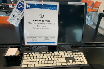 caption: A computer at the Seattle Public Library's central branch on June 5, 2024. A cyberattack on May 25 took out most of the library's digital systems. 