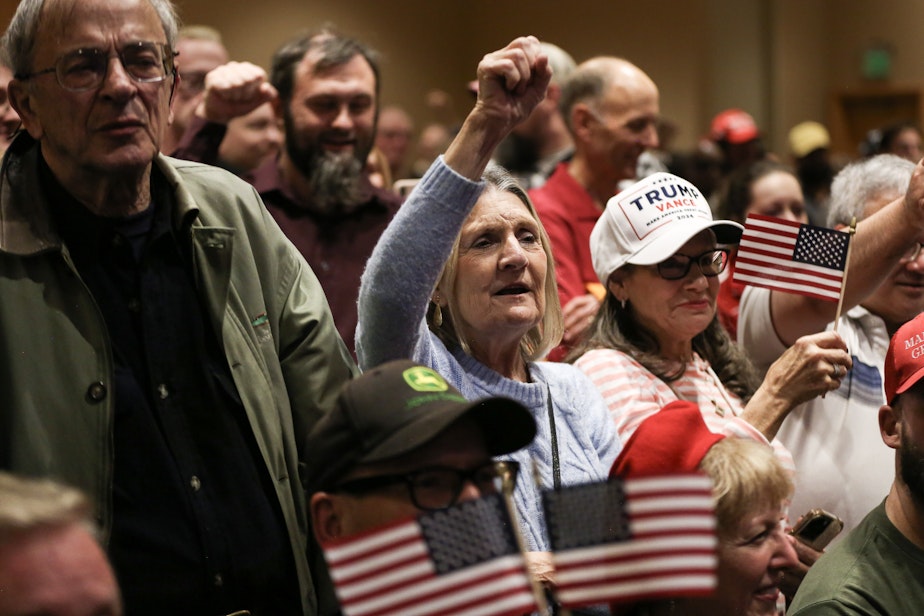 caption: Guests at the WAGOP Election Night Watch Party in Bellevue, cheer candidate for governor Dave Reichert.