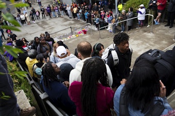 caption: Garfield high school students are welcomed back to school by parents and community members following the fatal shooting of 17-year-old student Amarr Murphy the previous Thursday, on Tuesday, June 11, 2024, at Garfield High School in Seattle. 