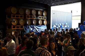 caption: Supporters gather for a primary election night party for Bob Ferguson, the Democrat gubernatorial candidate for Washington state, on Tuesday, August 6, 2024, at Reuben’s Barrel House event space in Seattle. 