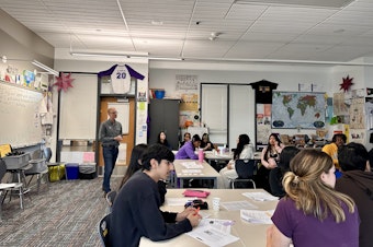 caption: David Ruby, a social studies teacher at Highline High School, listens to a discussion in his classroom Monday, the day before Election Day. He's made it his mission to teach his students about civil discourse in these politically-polarized times.