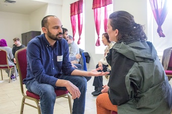 caption: Participants at KUOW's Ask A Muslim event at MAPS in Redmond, Washington.