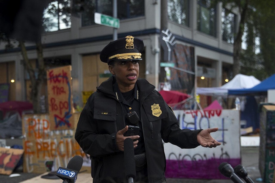 caption: Seattle Police Chief Carmen Best holds a press briefing after the Capitol Hill Organized Protest zone was cleared by Seattle Police Department officers early Wednesday morning, July 1, 2020, at the intersection of 12th Avenue and East Pine Street in Seattle.