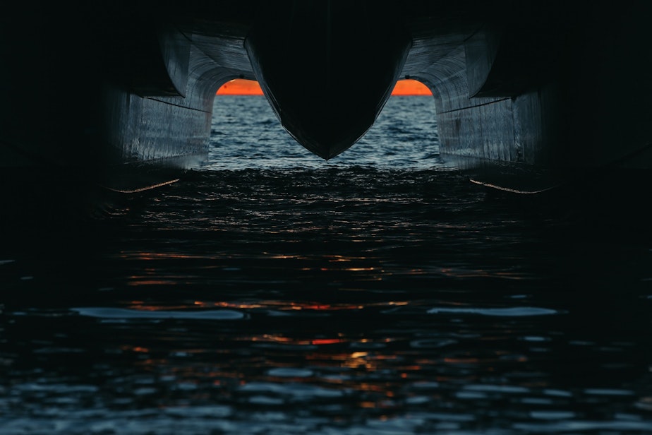 caption: The King County Water Taxi sets off across Elliott Bay from West Seattle, September 1, 2021.
