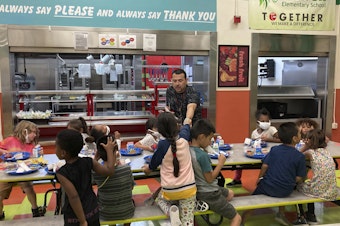 caption: Students finish their lunch at Lowell Elementary School in Albuquerque, N.M., on Aug. 22, 2023. A legislative proposal would ban six artificial food dyes in California schools.