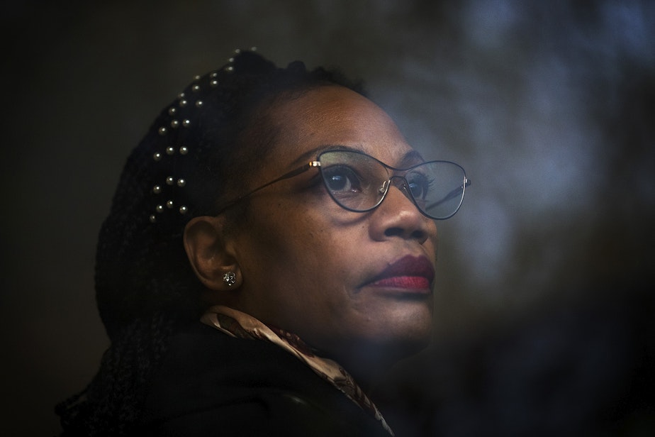 caption: Jacquelyn Flaherty, a kindergarten teacher, is portrayed on Friday, November 20, 2020, at her home in Bothell. Flaherty, who works at View Ridge Elementary, recounted seeing a second-grade boy in an outside enclosure, where other staff members said he had spent whole days, and eaten lunch while sitting on the concrete floor.