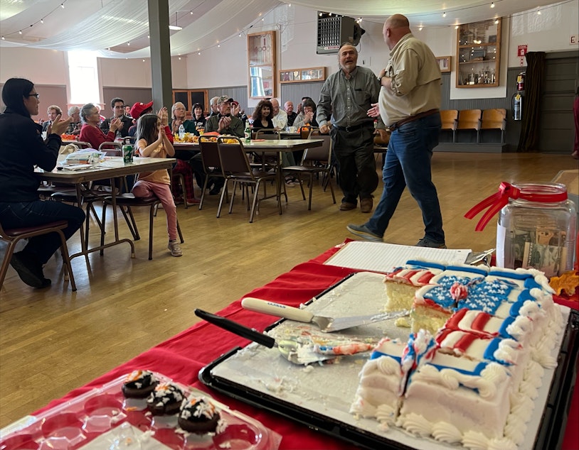 caption: State Sen. Drew MacEwen, a Republican candidate for Washington's 6th Congressional District, meets with voters at a "Candidate Oktoberfest" event in Port Angeles.