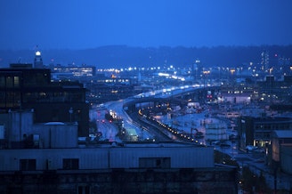 caption: Morning traffic is shown on Tuesday, Dec. 5, 2023, in Seattle. An atmospheric river has hit Western Washington with winds, heavy rain, and possible flooding. 