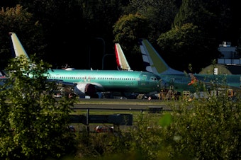 caption: Unpainted Boeing 737 Max aircraft are seen, Tuesday, Sept. 24, 2024, at the company's facilities in Renton, Wash. 