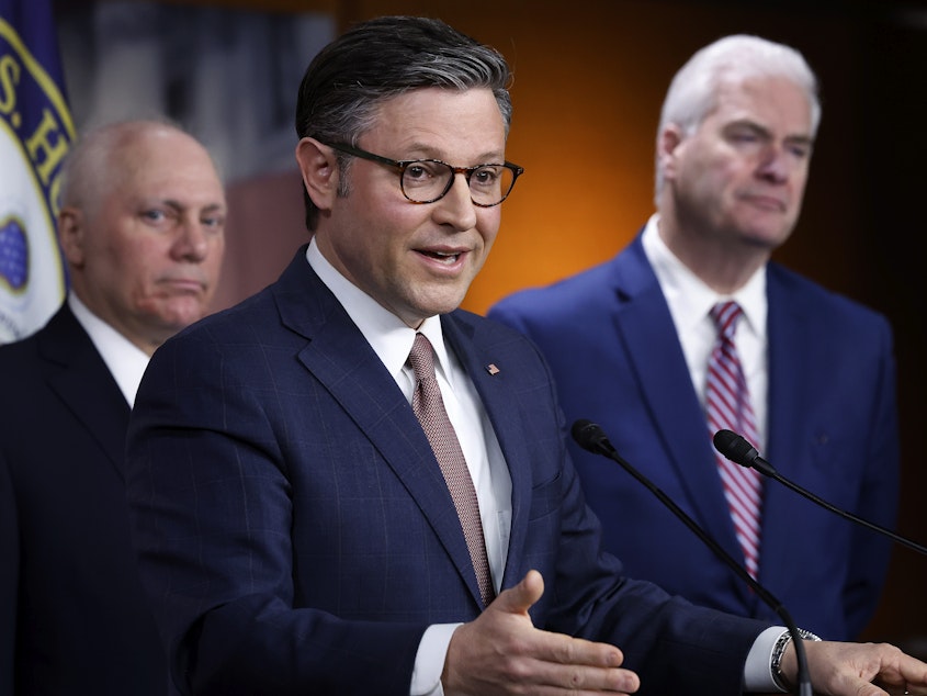 caption: Speaker of the House Mike Johnson speaks about the spending package during a news conference on March 20. The House of Representatives went on to pass six appropriations bills funding the government on Friday.